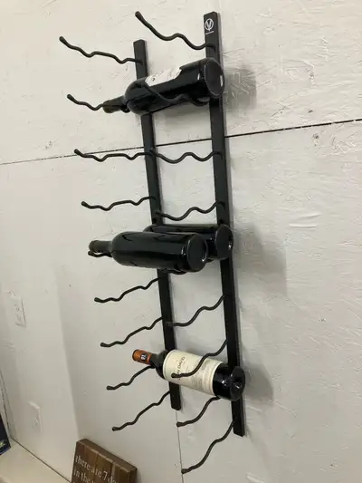 Wall mounted wine rack. Vintageview. Holds/displays 18 bottles. Two pairs left. $50 per pair.