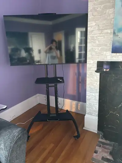 50 inch Hisense tv with rolling stand , View more