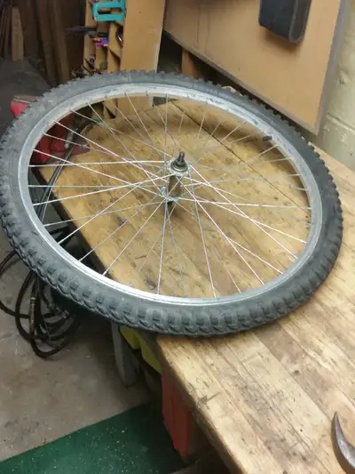 Front Bicycle Wheel 26" and Tire for sale in good condition. Wheel is straight and there is lots of...