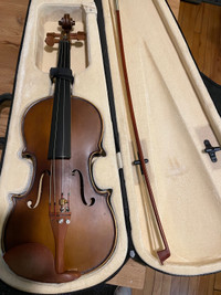 Old violin for sale.  $200 .  In its case