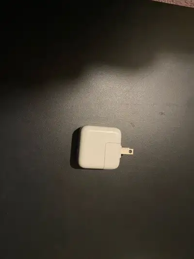 12w AC adapter for iPhone iPad for sale, output: 5.2V, 2.4A, model A1401, in good working order, ask...