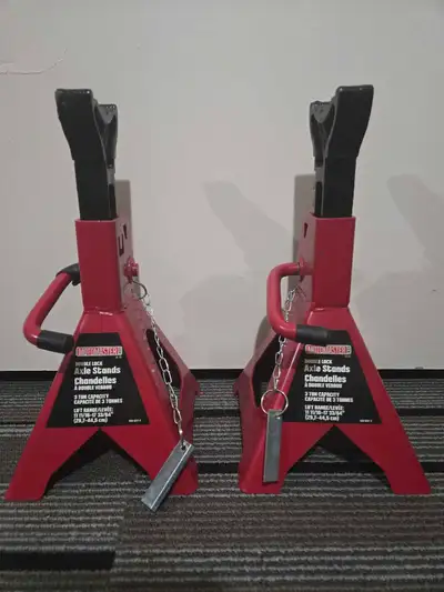 Two red MotoMaster jack stands. 3-ton capacity. Double lock. Great condition, used once. pick up in...