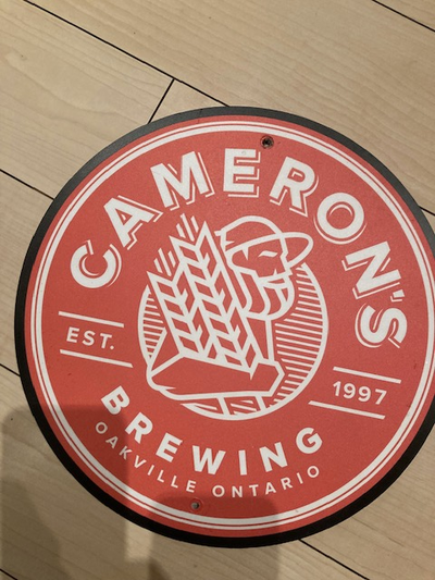 I am selling a Cameron's Brewing beer sign for $20. Made of thick cardboard, the sign measures 11 1/...