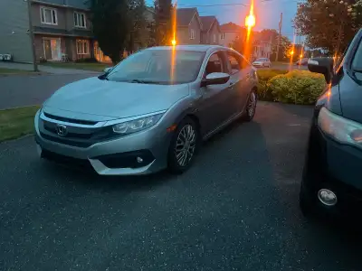 Honda Civic ex-t 2016 automatique 156 000 kilomètres, imperfection sur l’aile arrière gauche (leur p...