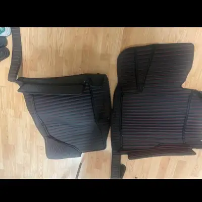 Protect your vehicle interior with these durable, custom-fit floor mats featuring a sleek black fini...