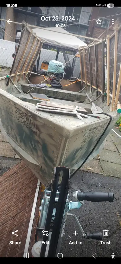This 14-foot aluminum hunting and fishing boat is a reliable, used vessel perfect for your next outd...