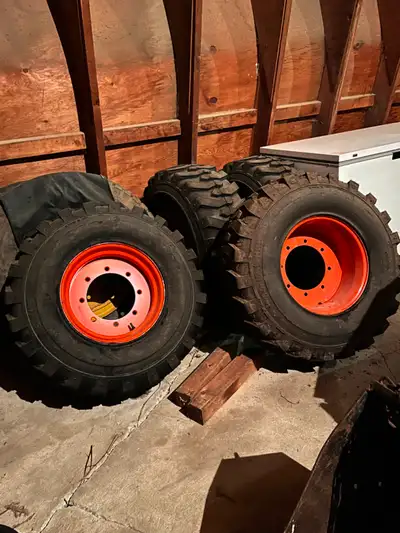 A complete set of 4 new Bobcat 14x17.5 HD tires on new 17.5 rims. To be sold as a set. $3700.00 + GS...
