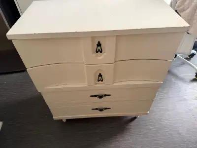 White, four-drawer dresser in good condition, View more