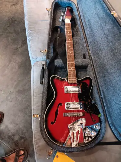 This is an early 1960's electric guitar made by Fujigen as part of their Pyramid Edition and it is i...