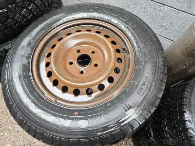 TR-218 Steel Rims w/ 235/65R16 KPatos FM809 Winter Tires Pulled from a 2006 Honda Odyssey, the rims...