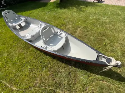 14.5 ft Pelican explorer canoe with paddles. seats 3, storage under middle seat, 2 fishing rod holde...