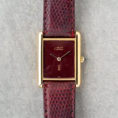 1980s Cartier Tank Must Large Burgundy Ref.6 81006 Specs Caliber: Cal. 81 Quartz Movement Case Width...