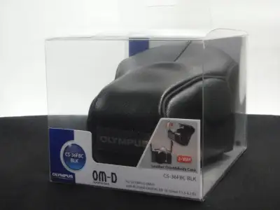 Various Olympus MicroFourThirds Access.- case, hood, flash, grip, View more