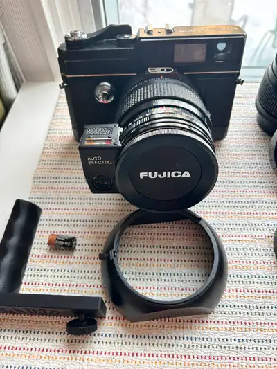 Hello and thanks for looking at this listing for a nearly complete set of lenses and accessories for...