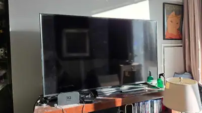Sharp 65" 4K UHD Roku Smart TV, View more