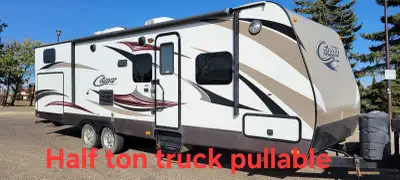 In excellent condition. Everything works. Sleeps 9 Outdoor kitchen 29ft light weight Pulls with half...