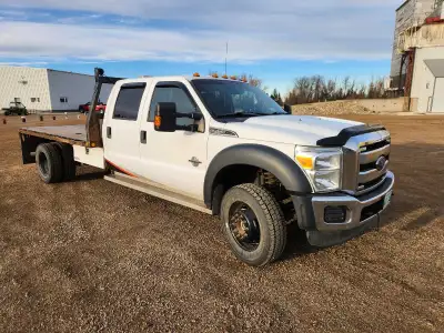 2016 Ford F450 4x4 crew cab, 6.7L diesel deleted, automatic, 11ft flat deck, leather seats, power to...