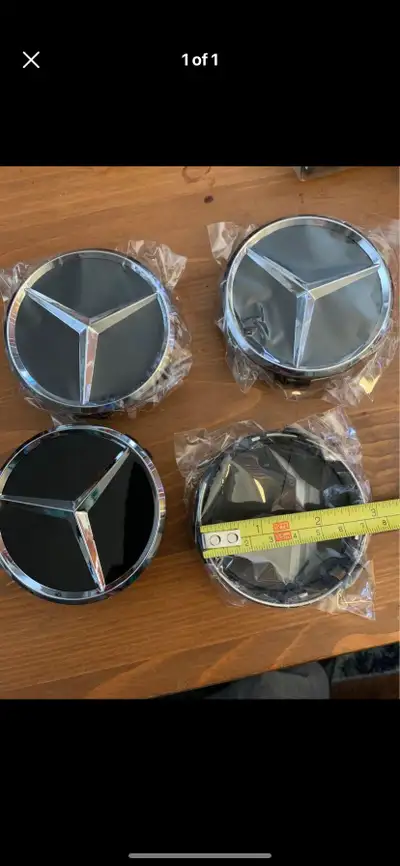 Black and chrome, 75 mm Mercedes centre caps for rims Brand new in package Check out my ads for othe...
