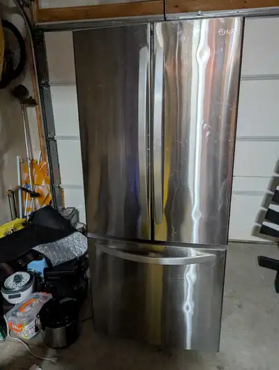 Free fridge. Broken for Scrap metal, stainless steel., View more