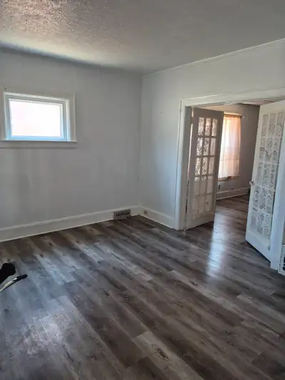 Large roomy 2 bedroom + 1 bathroom. Front and rear porch, rear porch nice and private as well as the...