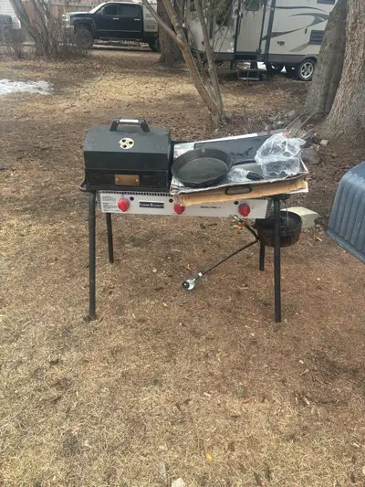 I got a champ chef Denali 3 burner stove come with 2 flat tops and a bbq and cast iron pot and pan a...