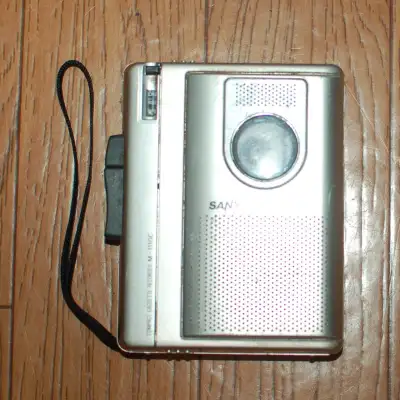 Portable tape player recorder, has built in speakers and mic, or use headphones or an external mic....