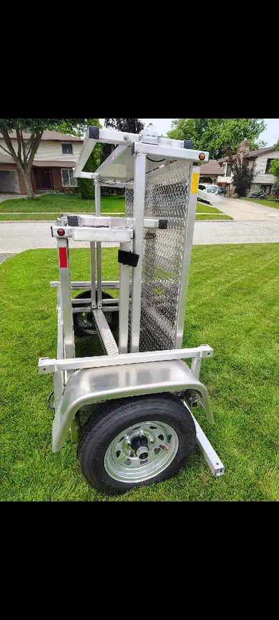 Folding all-aluminum (nonrusting) utility trailer, 4'x8' (but extends to 11 ft with ends down), fold...