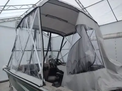 1999 Monark Aluminum Fishing boat and 1999 ezlo trailer. 60 HP Evenrude etech 2 Stroke outboard moto...