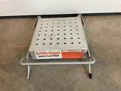 Work platform - hooks onto ladder giving user a platform to stand on Paint platform - hooks onto lad...