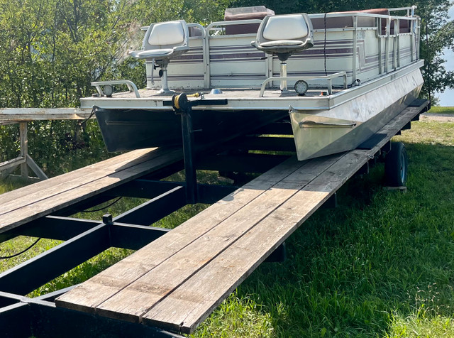 REDUCED: 1988 21’ Ercoa Pontoon with 1978 55HP on a 30’ flatbed in Powerboats & Motorboats in Regina