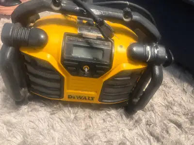 Selling a DeWalt DCR015 heavy-duty worksite radio and battery charger. It runs off a standard plug-i...