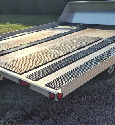 Ownership papers in my name... TRITON XL Double snowmobile trailer in close to brand new condition.....