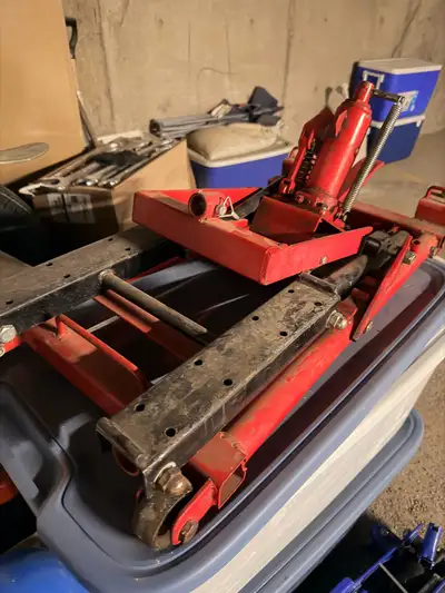 Price: $110 OBO Selling a heavy-duty hydraulic motorcycle/ATV lift. Perfect for maintenance, oil cha...
