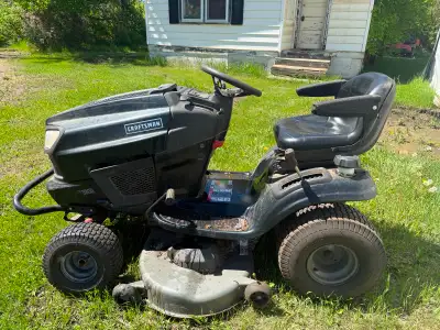 Craftsman 24 hp riding lawn mower with 46 inch cutting deck Needs a new left front rim and new steer...