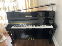 Great condition Handok upright Piano 