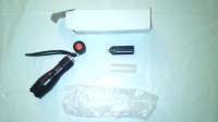 New in the box Super bright led multi setting flashlight...