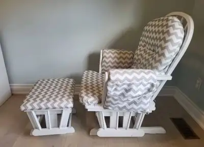 This is a used Storkcraft glider chair and ottoman, perfect for a nursery or any cozy corner! The ch...