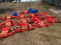 13 high flotation Whitewater lifejackets and helmets for sale