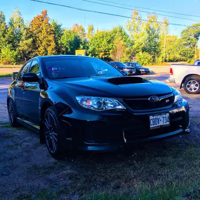 Selling my 2012 Subaru WRX STI. Car runs strong and has been carefully modified. It deserves to be d...