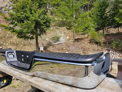 New never installed rear bumper for 2014 ram 2500 comes with all new hardware. Please call 250-365-5...