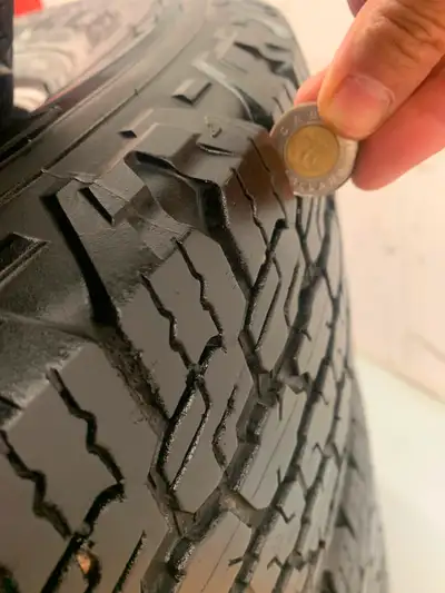 Four excellent condition Goodyear Wrangler all terrain adventure tires off rim with good tread left....