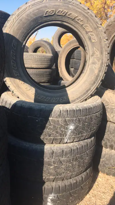 BRIDGESTONE DUELER A/T revo 2 LT275/65 R18 123/120S M+S Set of 4 tires - $260 CALL 78O8517382 Or tex...
