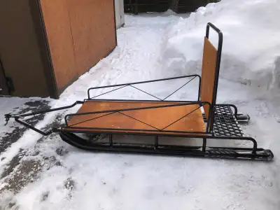 Kimpex dog sleigh style sled in like new condition. Pull behind a snowmobile or a dog team