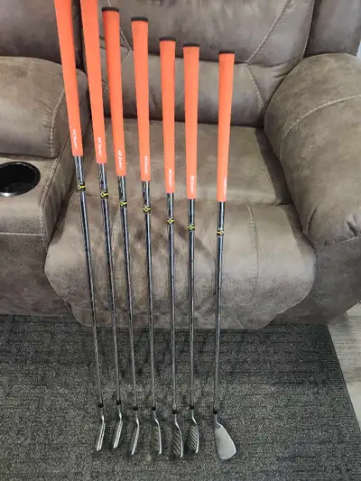 Set of Taylor made RAC irons....7 clubs in total....4 iron to pitching wedge....good condition...new...