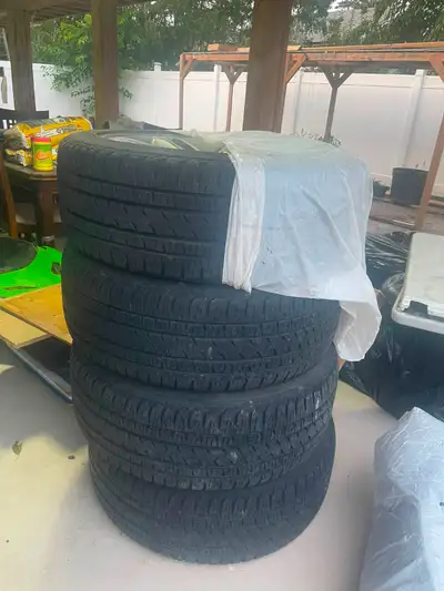 Up for sale is a set of 4 tires mounted on rims! PRICE NEGOTIABLE Condition: Previously owned, perfe...
