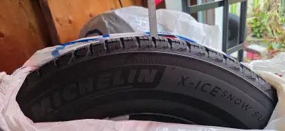 Set of 4 245/70R17 Michelin Latitude X-ICE winter tires on steel rims for Chevy Traverse or other SU...