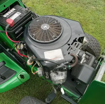 Tracteur John Deere16HP (PAS DE TONDEUSE) REMORQUE INCLUSE, View more