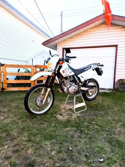 2018 dr650 basically brand new stock bike. One owner only drove it for two years and parked the rest...