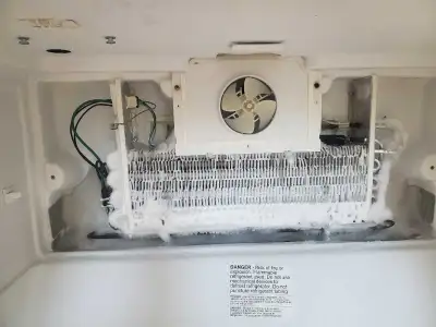 appliance repair - fridge repair with cooling issue, View more