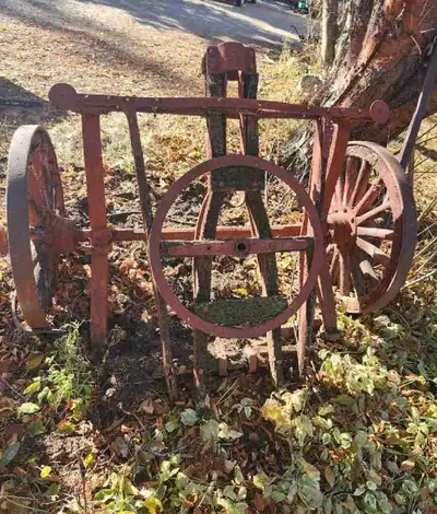 Antique grain wagon front end. Must move yourself. It is heavy. IF AD IS UP IT IS AVAILABLE